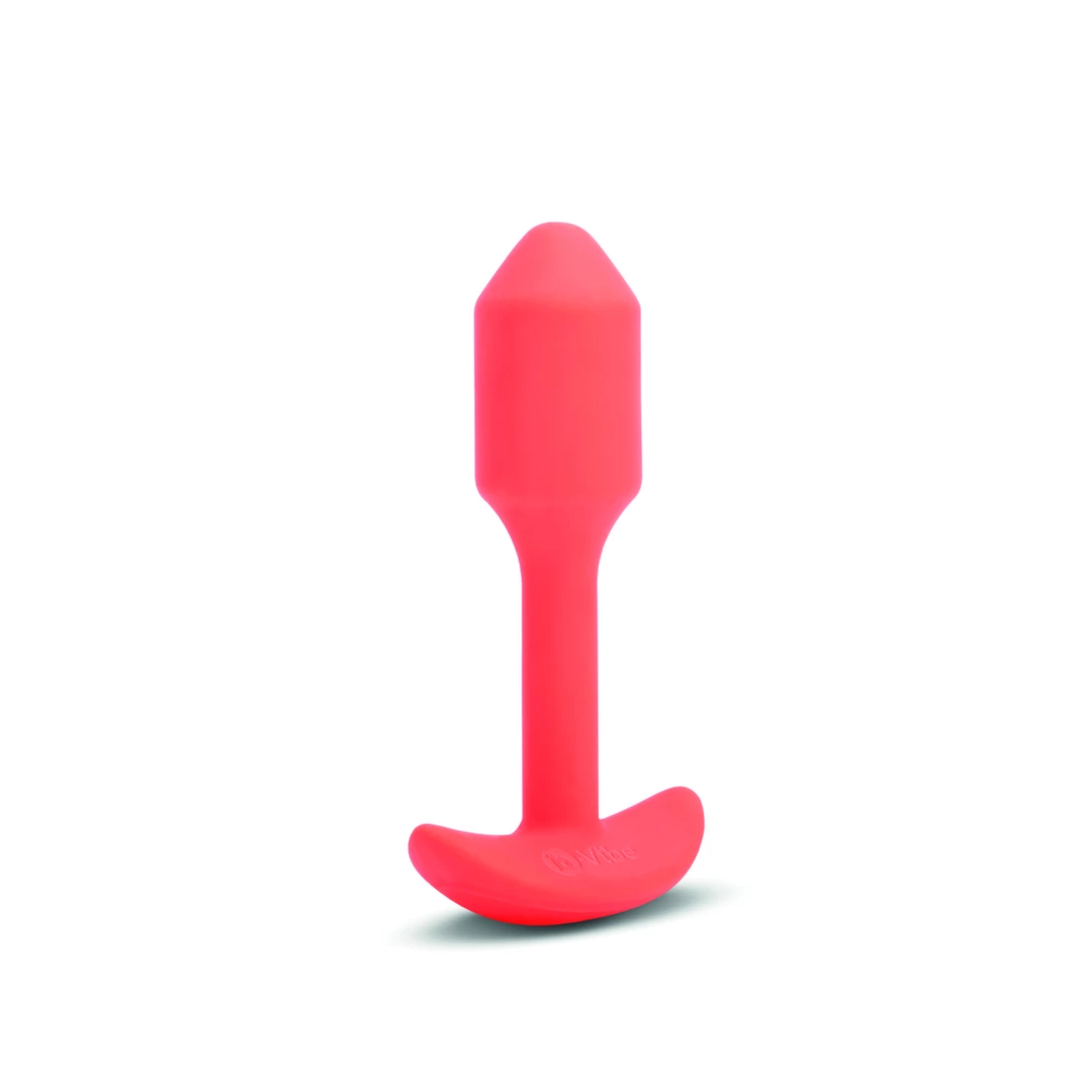 b-Vibe Snug Plug 1 vibruojantis analinis kaištis su svarmeniu, oranžinis
