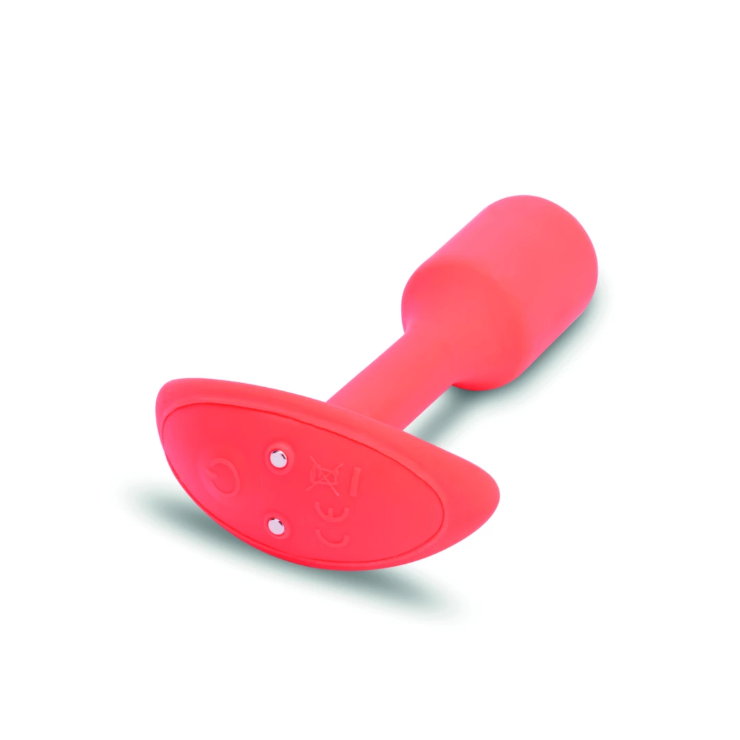b-Vibe Snug Plug 1 vibruojantis analinis kaištis su svarmeniu, oranžinis